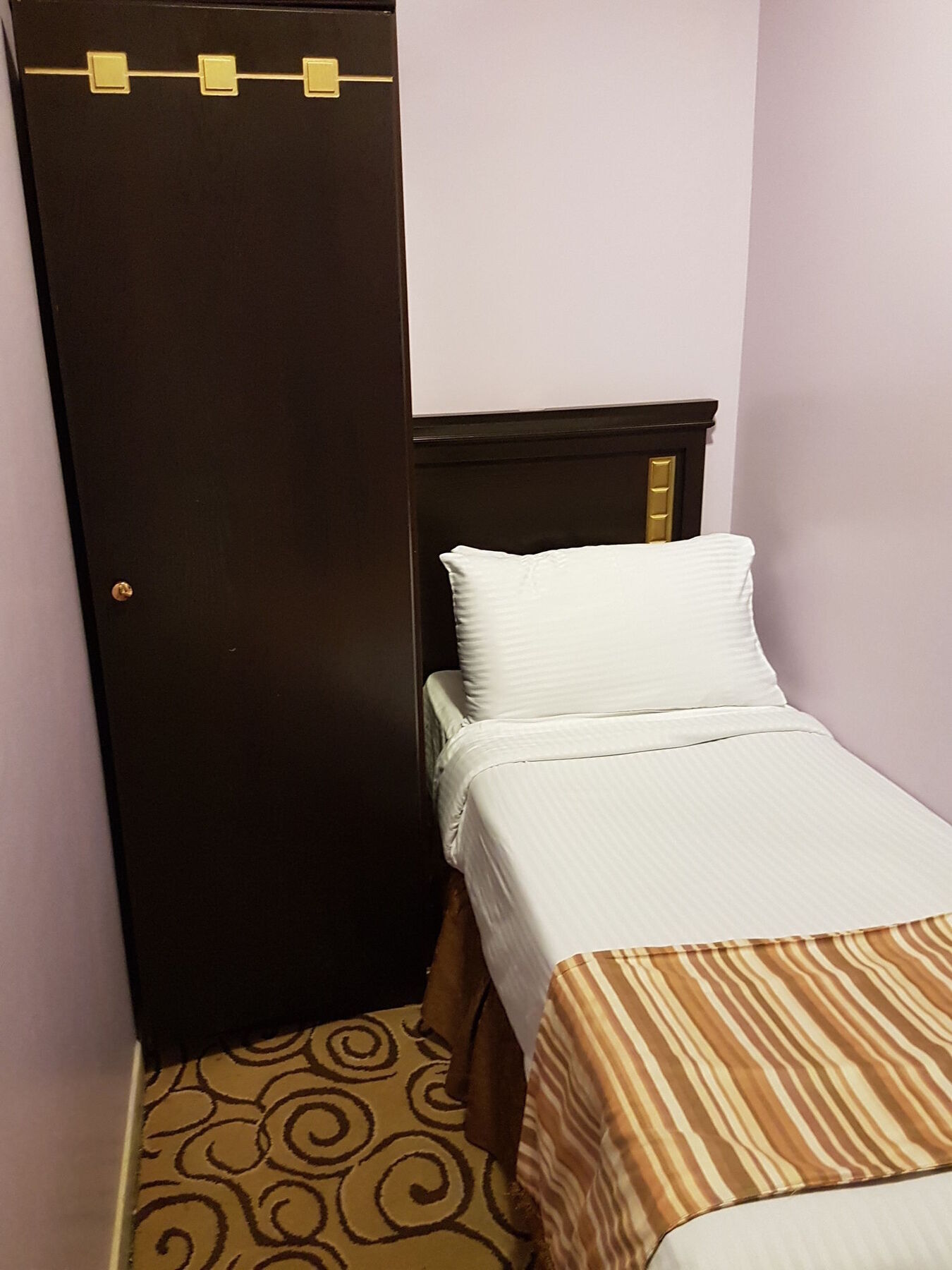 Taiba Suites Madinah Medine Dış mekan fotoğraf A single bed